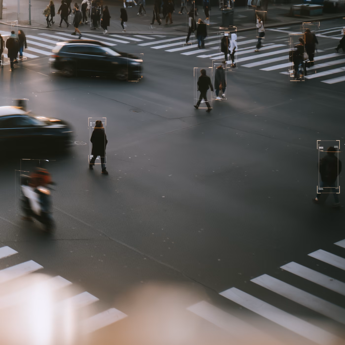 A car on a road at night, the foreground out of focus.