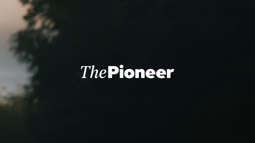 The Pioneer wordmark over a blurred photograph of foliage at dusk, a pale sky on the left.